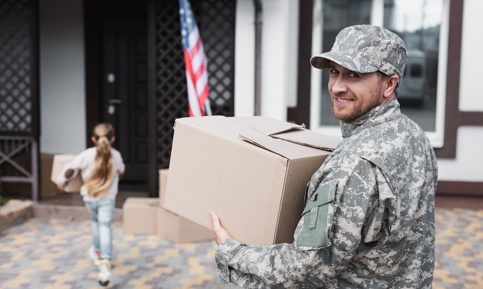 veteran dad walking into new home